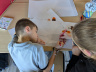 Travail a plusieurs mains.